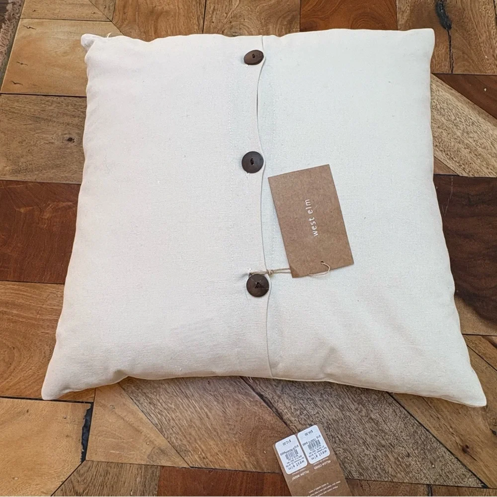 Two West Elm Gold and Gray Patterned Accent Pillows